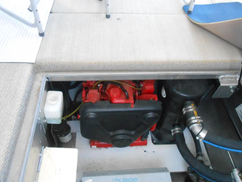 Slide: The Image of Engine compartment of a 2001 Stardust Cruisers houseboat. - 18