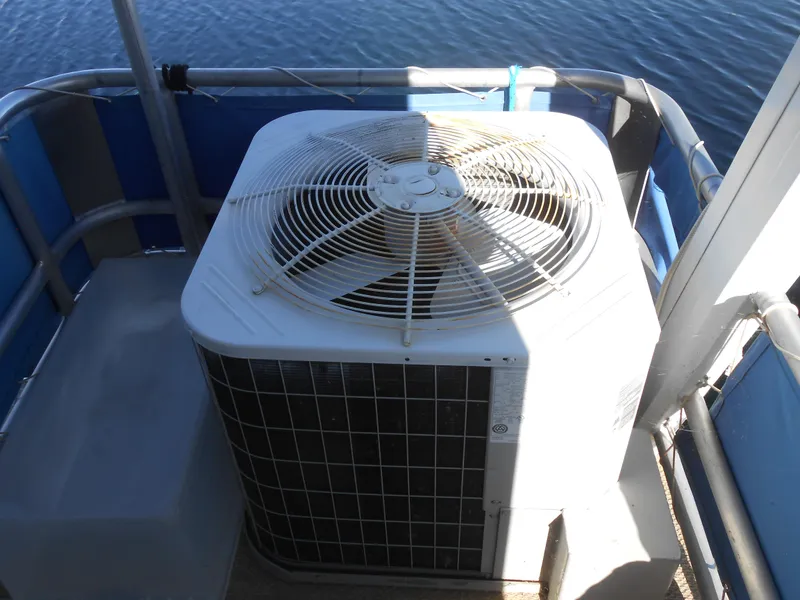 Slide: The Image of Air conditioning unit on a 2001 Stardust Cruisers houseboat deck. - 19