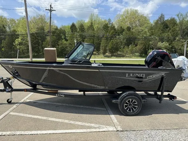 Slide: The Image of 2024 Lund 1775 Adventure Sport fishing boat on trailer. - 10