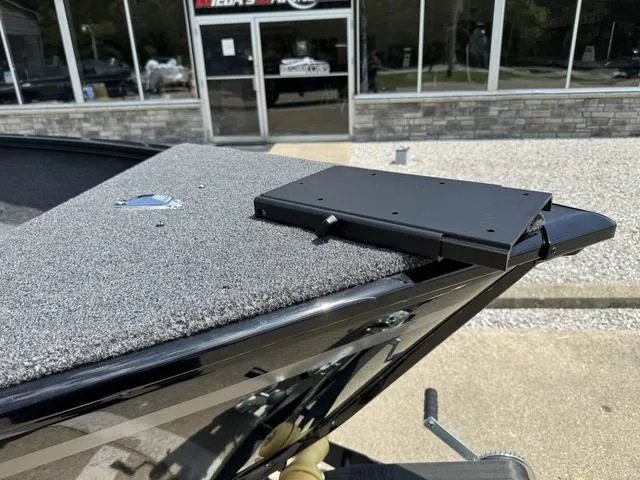 Slide: The Image of 2024 Lund 1775 Adventure Sport boat bow with carpeted deck and mounting bracket. - 8