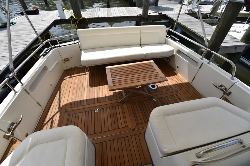Slide: The Image of 2011 MJM 40z Downeast boat with teak deck and white seating. - 10