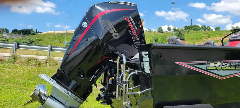 Slide: The Image of 2024 Ranger VX1988 WT boat with powerful Mercury 250 Pro XS engine, outdoors on a sunny day. - 2