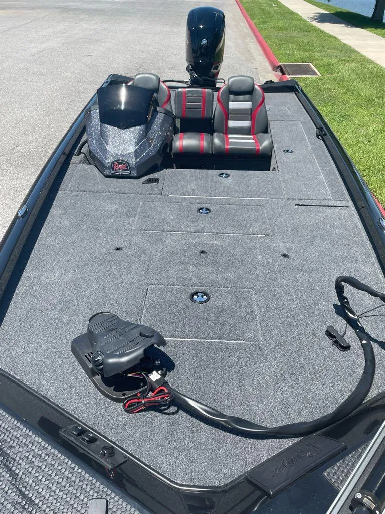 Slide: The Image of 2024 Ranger RT178C fishing boat with spacious deck and seating. - 4