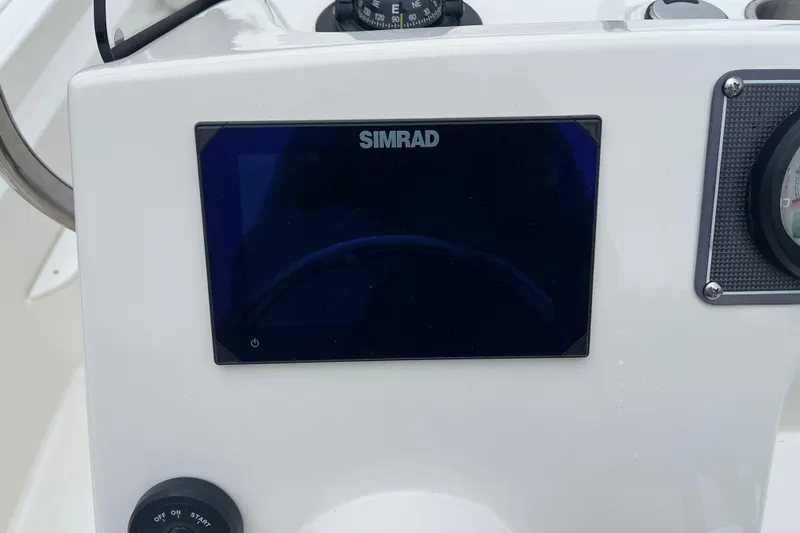 Slide: The Image of Simrad display on 2026 Boston Whaler 170 Montauk boat dashboard. - 16