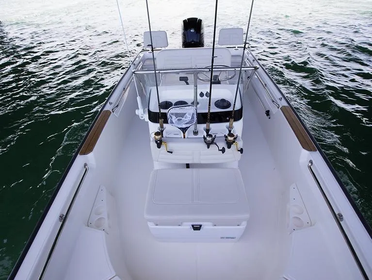 Slide: The Image of 2026 Boston Whaler 170 Montauk boat with cushioned bow seating area. - 8