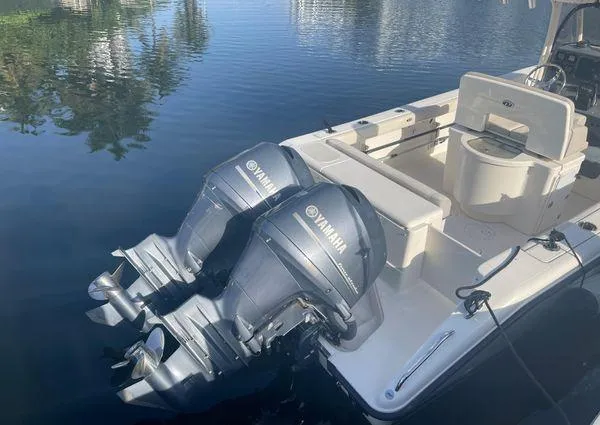 Slide: The Image of 2013 Pursuit C 260 Center Console boat with twin Yamaha outboard engines. - 16