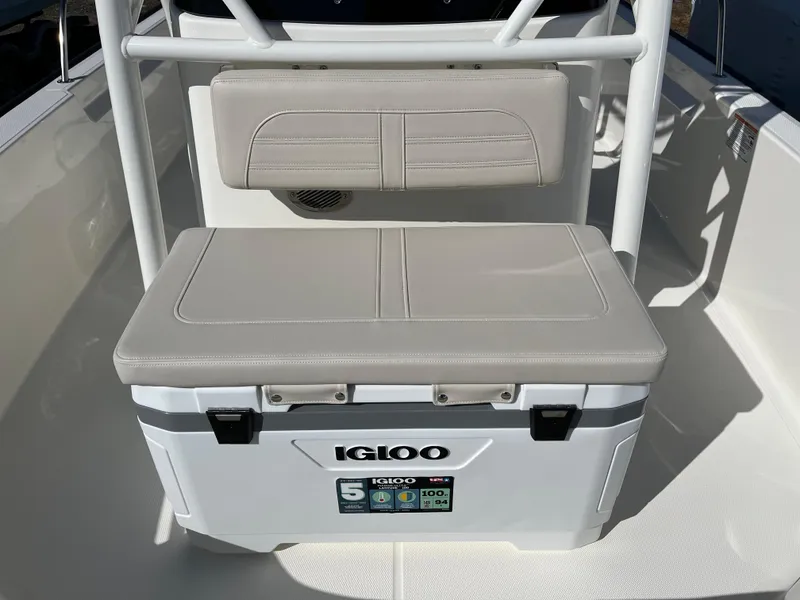 Slide: The Image of Boston Whaler 190 Montauk 2025 boat with Igloo cooler and cushioned seating. - 17