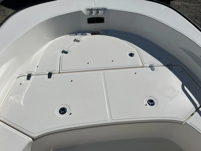 Slide: The Image of 2025 Boston Whaler 190 Montauk boat deck with storage compartments. - 22