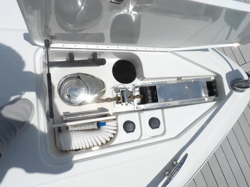 Slide: The Image of 2008 Formula 31 Performance Cruiser anchor locker with windlass and hose storage. - 16