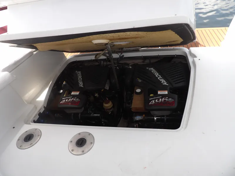 Slide: The Image of 2008 Formula 31 Performance Cruiser engine compartment with twin Mercury engines. - 18