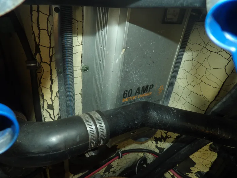 Slide: The Image of 2008 Formula 31 Performance Cruiser 60 AMP battery charger in engine compartment. - 25