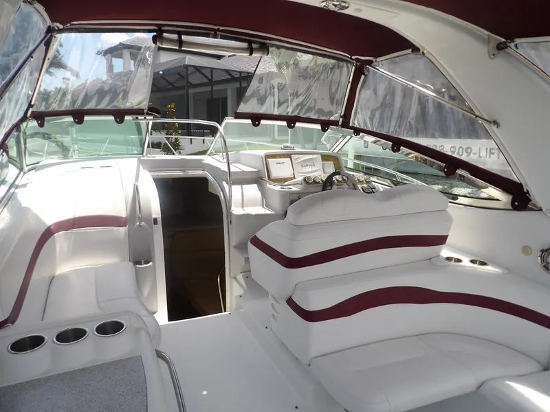 Slide: The Image of 2008 Formula 31 Performance Cruiser interior with white and maroon seating. - 28