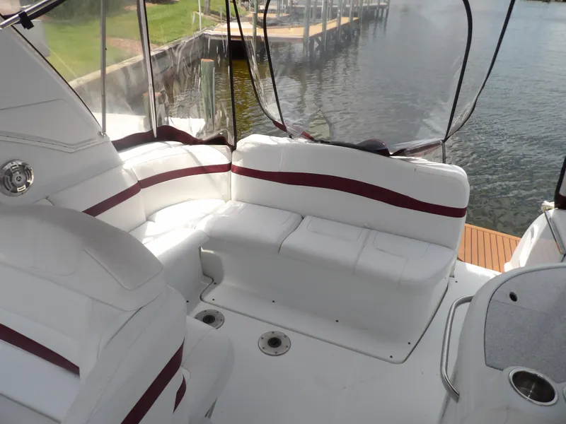 Slide: The Image of 2008 Formula 31 Performance Cruiser interior with white seating and red accents. - 29