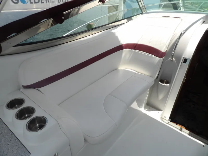 Slide: The Image of 2008 Formula 31 Performance Cruiser interior seating with cup holders. - 32