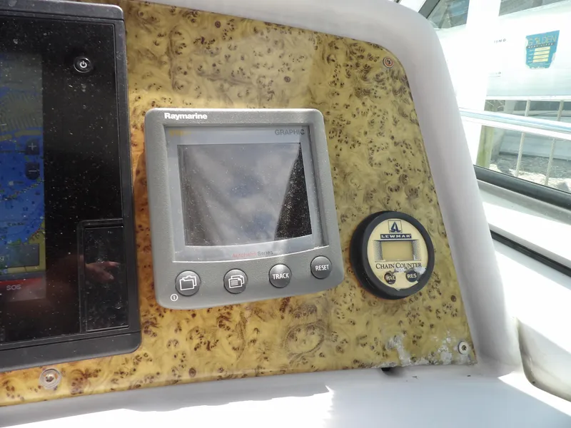 Slide: The Image of Control panel of a 2008 Formula 31 Performance Cruiser with Raymarine display. - 38