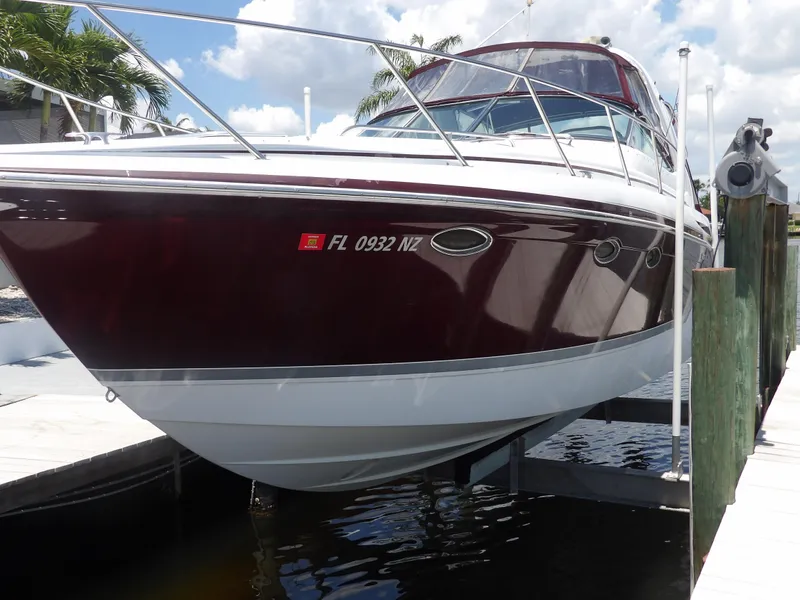 Slide: The Image of 2008 Formula 31 Performance Cruiser boat docked on a lift. - 5