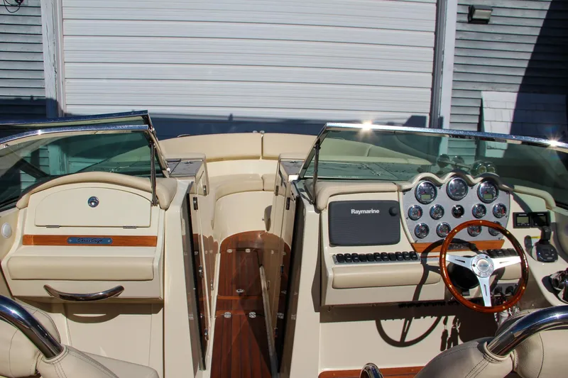 Slide: The Image of Dashboard of 2013 Chris-Craft Launch 32 with Raymarine display and gauges. - 27