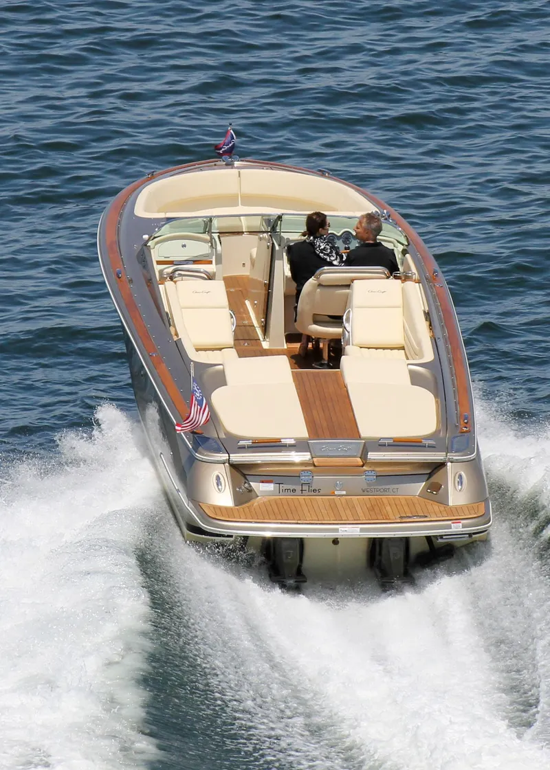 Slide: The Image of 2013 Chris-Craft Launch 32 boat with wooden handle detail. - 38