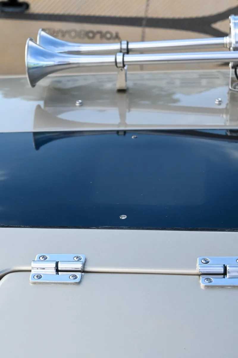 Slide: The Image of 2013 Chris-Craft Launch 32 helm with Raymarine electronics and wooden steering wheel. - 40