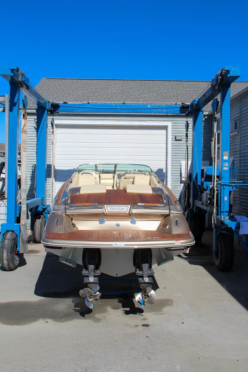 Slide: The Image of Close-up of dual chrome horns on a 2013 Chris-Craft Launch 32 boat. - 51