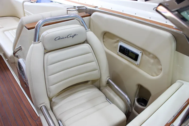 Slide: The Image of Luxurious interior of 2013 Chris-Craft Launch 32 boat with cream leather seating. - 64