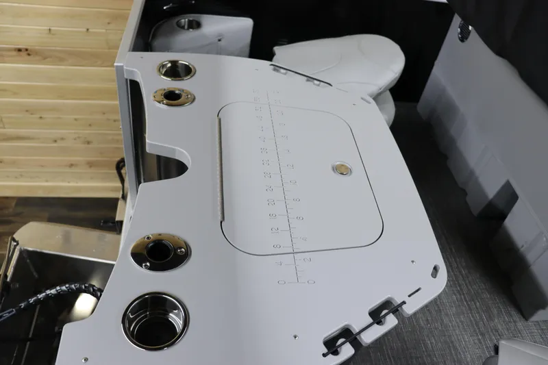 Slide: The Image of 2024 Bennington 20 SFNP boat interior with fishing station and cup holders. - 15