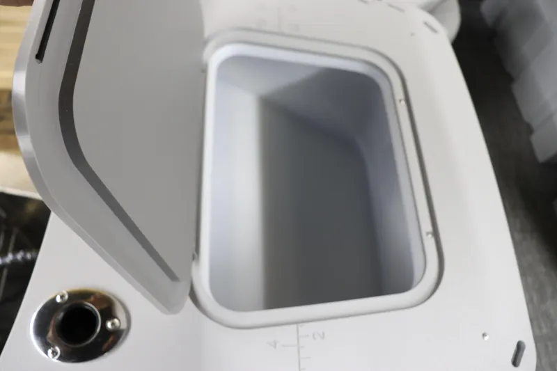 Slide: The Image of Open storage compartment on 2024 Bennington 20 SFNP boat. - 16