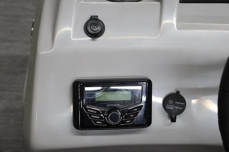 Slide: The Image of 2024 Bennington 20 SFNP boat dashboard with Kicker audio system. - 18