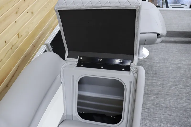 Slide: The Image of Open storage compartment in 2024 Bennington 20 SFNP boat seat. - 25