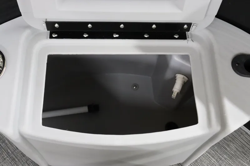 Slide: The Image of 2024 Bennington 20 SFNP boat storage compartment with open lid. - 29