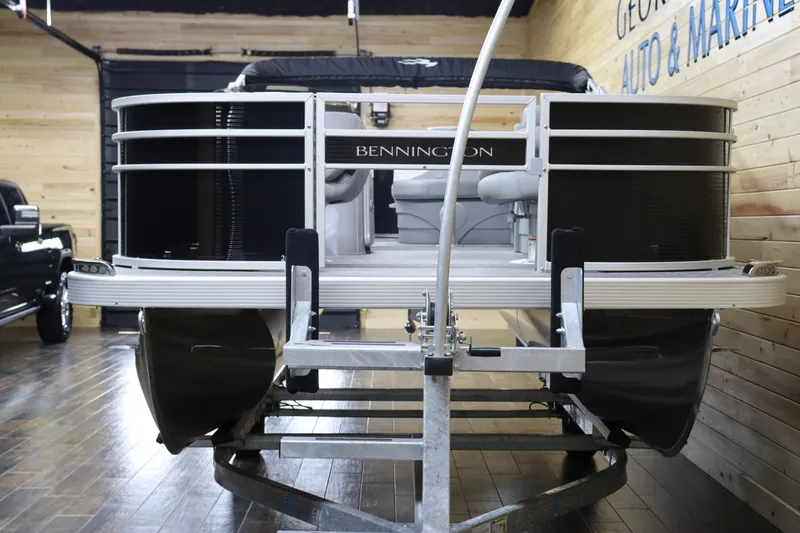 Slide: The Image of 2024 Bennington 20 SFNP pontoon boat on trailer in showroom. - 7