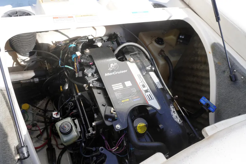 Slide: The Image of 2010 Sea Ray 175 Sport boat engine compartment with MerCruiser 3.0L engine. - 6
