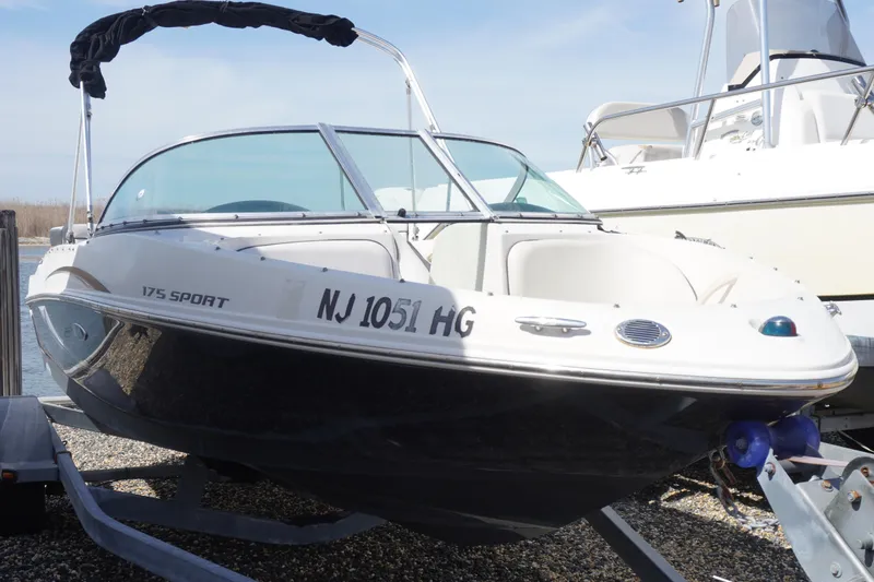 Slide: The Image of 2010 Sea Ray 175 Sport boat on trailer, side view. - 9