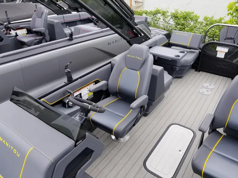 Slide: The Image of 2023 Manitou Explore Navigator 24 with Trifold Bench - SHP575 interior, featuring luxurious seating and modern design. - 4