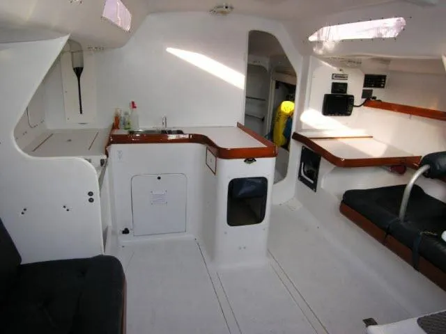 Slide: The Image of Interior of 1993 Green Marine Dubois 50 yacht with white and wood finish. - 18