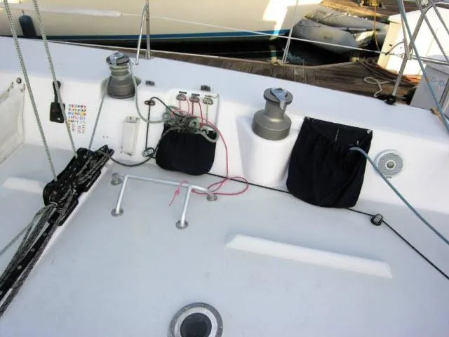 Slide: The Image of Cockpit of 1993 Green Marine Dubois 50 sailboat with winches and rope bags. - 22