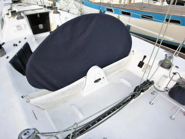 Slide: The Image of Cockpit of 1993 Green Marine Dubois 50 sailboat with covered steering wheel. - 24