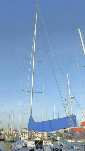 Slide: The Image of Sailboat in marina, Green Marine Dubois 50, 1993 model, blue sail cover. - 31