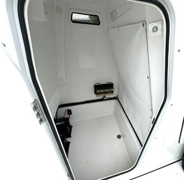 Slide: The Image of 2023 Sportsman Masters 267 Bay boat interior storage compartment. - 21