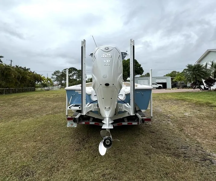 Slide: The Image of 2023 Sportsman Masters 267 Bay boat with Yamaha 425 engine on trailer. - 4