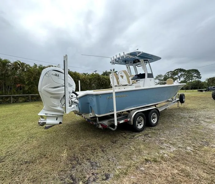 Slide: The Image of 2023 Sportsman Masters 267 Bay boat on a trailer with Yamaha outboard motor. - 6