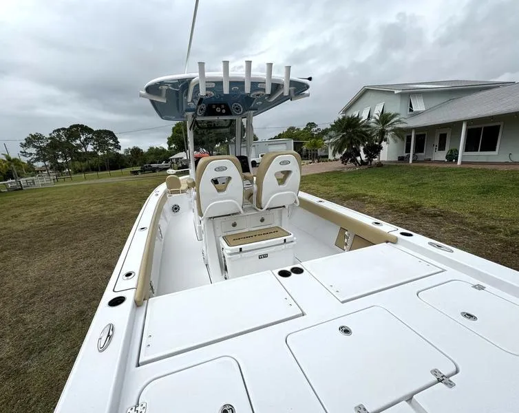 Slide: The Image of 2023 Sportsman Masters 267 Bay boat with spacious deck and seating. - 9