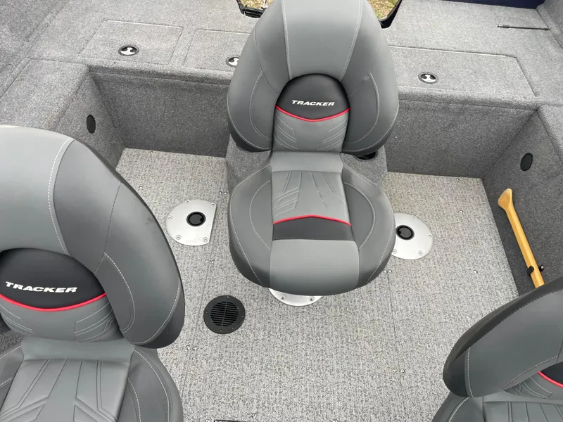 Slide: The Image of 2023 Tracker Pro Guide V-175 WT boat interior with gray seats and carpet. - 7