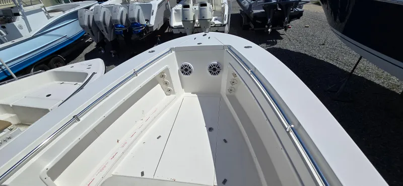 Slide: The Image of 2008 Contender 23 Tournament boat interior with speakers and storage compartments. - 10