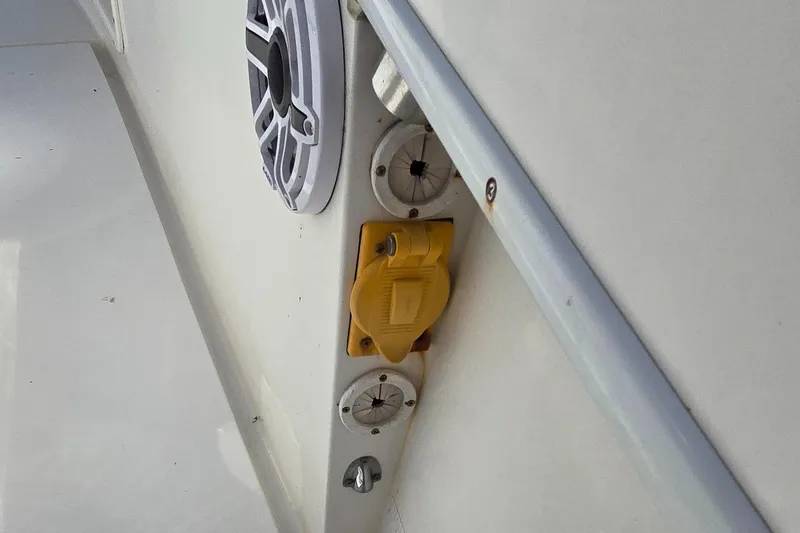 Slide: The Image of Close-up of a 2008 Contender 23 Tournament boat's speaker and electrical outlet. - 18