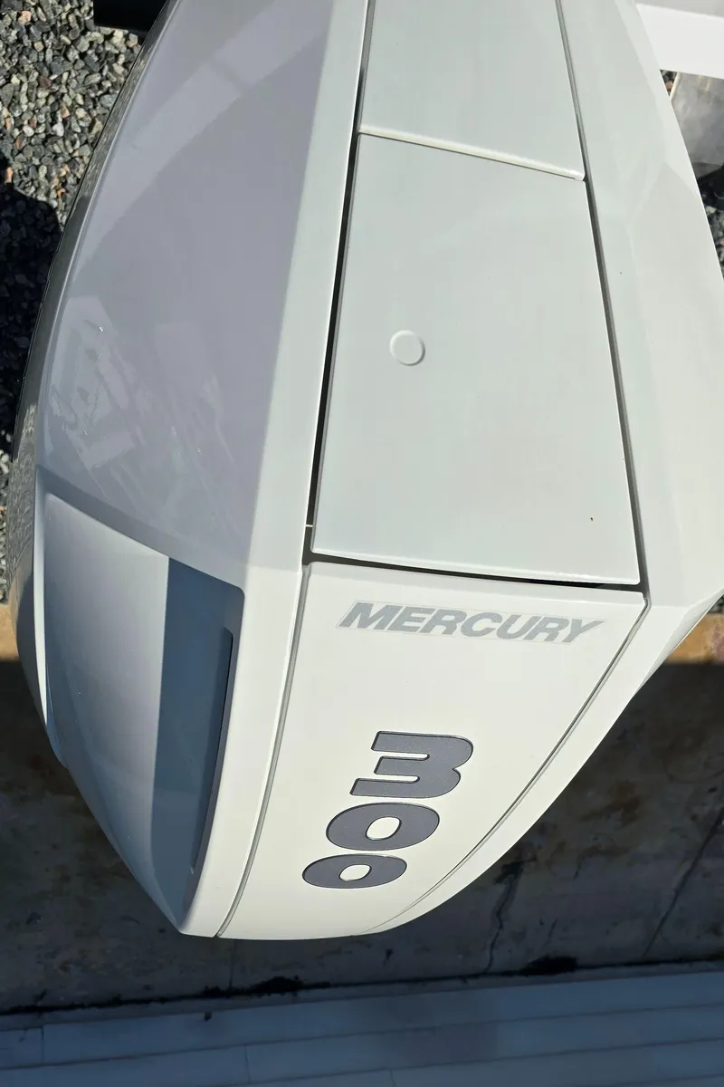 Slide: The Image of Mercury 300 outboard engine on 2008 Contender 23 Tournament boat. - 24