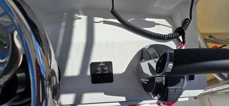 Slide: The Image of 2008 Contender 23 Tournament boat dashboard with controls and steering wheel. - 7