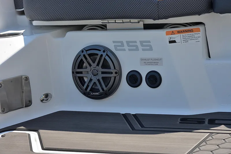 Slide: The Image of 2024 Scarab 255 ID boat speaker and control panel close-up. - 16