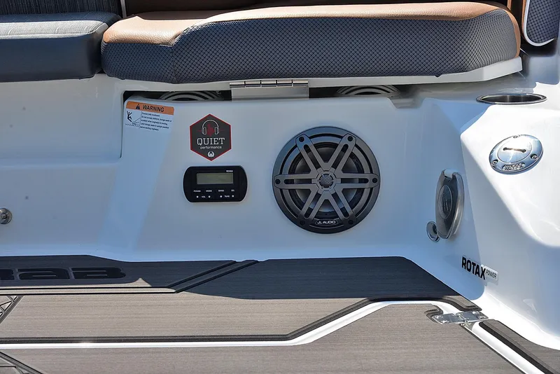 Slide: The Image of 2024 Scarab 255 ID boat interior with speaker and control panel. - 17