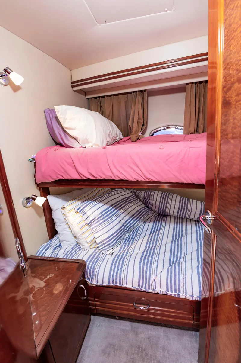 Slide: The Image of Bunk beds in 2004 Carver 56 Voyager SE yacht cabin. - 29